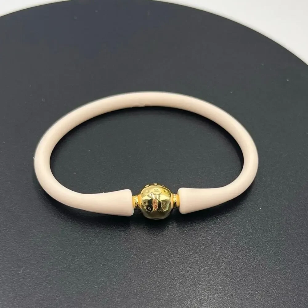 Gresham Florence Off White Silicone Water Resistant Hammered Gold Ball Bracelet